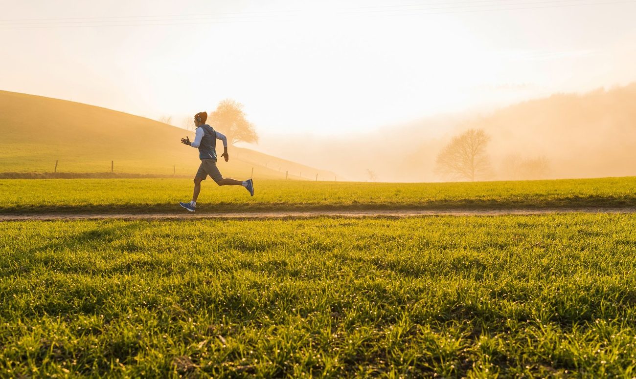 Image of a man running in the field